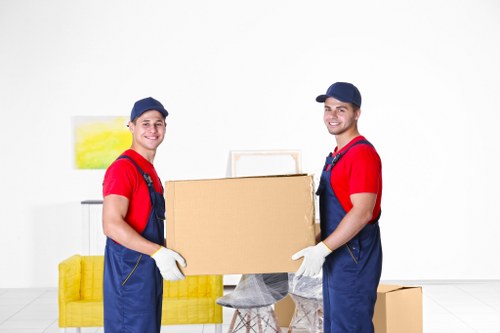 Movers preparing a local home relocation in Queens Park