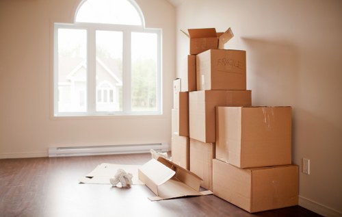 Professional movers handling a flat move in Queens Park