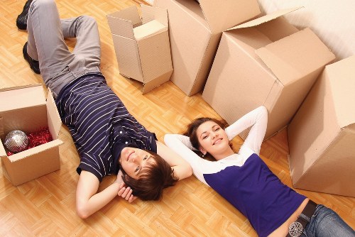 Local movers handling household furniture and boxes