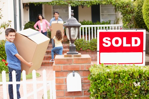 Careful packing and furniture handling inside a Queens Park flat